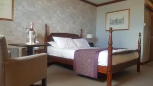 Vuode tai vuoteita majoituspaikassa The Shetland Hotel