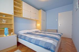 Postel nebo postele na pokoji v ubytování Apartment Marty