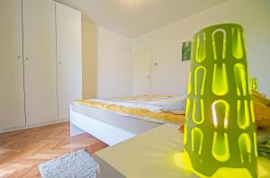 Postel nebo postele na pokoji v ubytování Apartment Marty