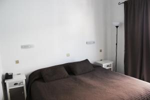 Postel nebo postele na pokoji v ubytování Hotel Marko