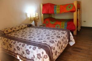 Postel nebo postele na pokoji v ubytování Cabaña hostal Ema + 36 fotografií