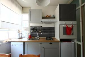 Kuchyň nebo kuchyňský kout v ubytování Apartment Melon