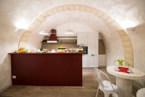 Кухня или кухненски бокс в Il Paradiso a Claustro Inferno