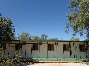 a building with doors and windows on it at Broome Bird Observatory in Broome