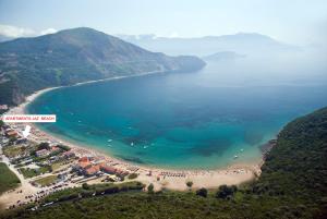 an aerial view of a beach with a group of people at Apartments Kristina Jaz Budva in Budva