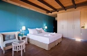 Posteľ alebo postele v izbe v ubytovaní Ornella Beach Resort & Villas