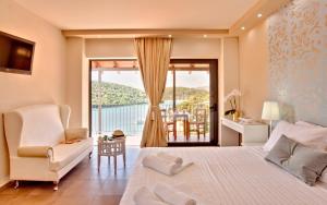 Posteľ alebo postele v izbe v ubytovaní Ornella Beach Resort & Villas