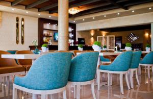 Posedenie v ubytovaní Ornella Beach Resort & Villas