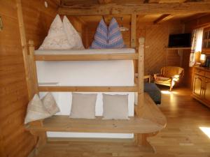Poschodová posteľ alebo postele v izbe v ubytovaní Ferienhaus Schett