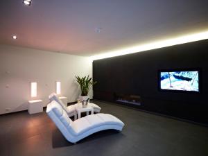 TV a/nebo společenská místnost v ubytování B&B Aquabello