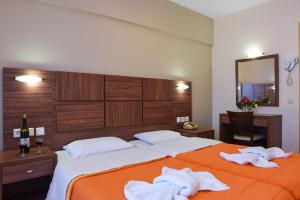 Posteľ alebo postele v izbe v ubytovaní Hotel Eleana