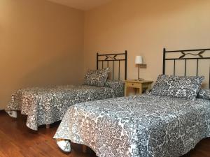 מיטה או מיטות בחדר ב-Chalet La Caleya