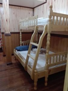 a couple of bunk beds in a room at Koreen Guest House in Banaue