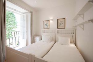 Katil atau katil-katil dalam bilik di Lovely Apartment In Sintra