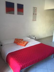 A bed or beds in a room at Casa Olbia