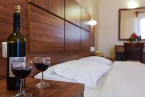 Posteľ alebo postele v izbe v ubytovaní Hotel Eleana