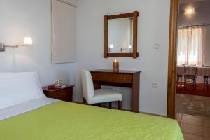 Postel nebo postele na pokoji v ubytování Enastron Villas