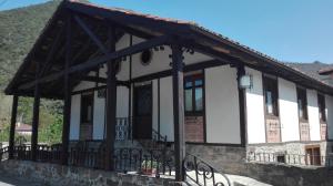 an old building with a black and white at Casa Leny in La Vega
