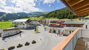 an aerial view of a town in the mountains at Apart-Hotel Bergkönig in Fiss