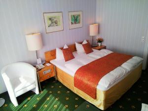 Voodi või voodid majutusasutuse Alexa Hotel toas