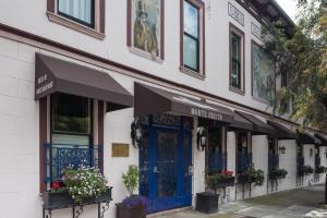 a building with a blue door on a street at Monte Cristo Bed and Breakfast in San Francisco