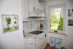 Een keuken of kitchenette bij Zur Mühle