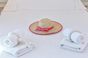 Cama ou camas em um quarto em La Maison Blanche