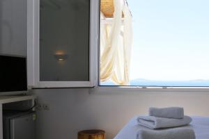 Cama ou camas em um quarto em La Maison Blanche