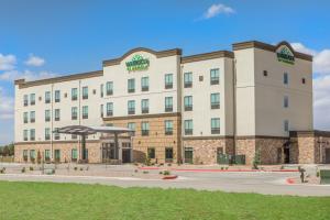 a rendering of the front of a hotel at Wingate by Wyndham Lubbock in Lubbock