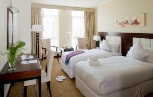 Barceló Cairo Pyramids 객실 침대