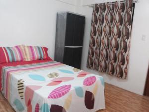 Letto o letti in una camera di Budget Studio Unit in Makati