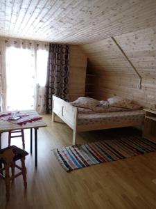 Postel nebo postele na pokoji v ubytování Cabana Ghetari