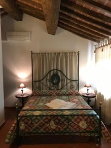 Postel nebo postele na pokoji v ubytování Villa Loghino