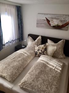 Postel nebo postele na pokoji v ubytování Ferienwohnung Beate Hassler