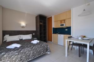 Kuchyň nebo kuchyňský kout v ubytování Aparthotel Safari
