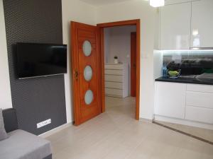 Kuchyň nebo kuchyňský kout v ubytování Apartament Białe Piaski