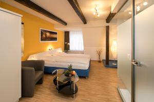 Postel nebo postele na pokoji v ubytování Hotel Alte Post