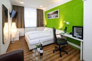 TV a/nebo společenská místnost v ubytování Hotel Alte Post