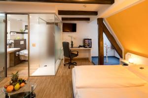 Postel nebo postele na pokoji v ubytování Hotel Alte Post