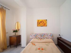 Łóżko lub łóżka w pokoju w obiekcie Appartamento il Panorama