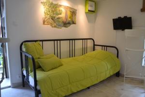 Ένα ή περισσότερα κρεβάτια σε δωμάτιο στο Maison Sous Le Pont