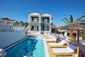 an image of a villa with a swimming pool at Villa Fylaktos in Limenaria