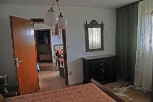 Postel nebo postele na pokoji v ubytování Apartments MM