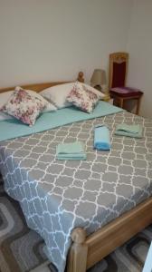 מיטה או מיטות בחדר ב-Guest House Adrijana