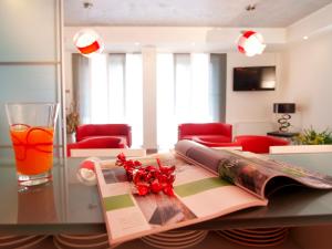TV o dispositivi per l'intrattenimento presso Hotel Garnì Corallo