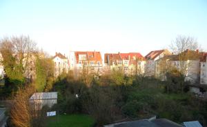 a view of a city with buildings and trees at Katharina Boardinghouse in Osnabrück