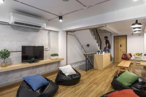 Posezení v ubytování ORA Hostel Bangkok