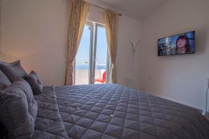 Postel nebo postele na pokoji v ubytování Villa Petra Apartment with private pool + 37 fotografií