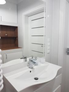 Kúpeľňa v ubytovaní Sun Apartament - Królewskie Kamieniczki