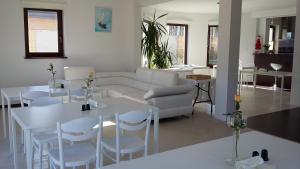 Posedenie v ubytovaní Apartamenty i Pokoje Na Letniej + 37 fotografií